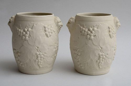 PAIR OF BISQUE POTTERY WINE COOLERS