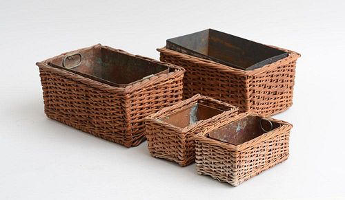 GROUP OF FOUR WOVEN WICKER BASKETS