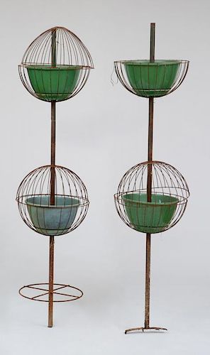 GROUP OF THREE METAL AND PLASTIC TWO-TIERED TOPIARY FIXTURES