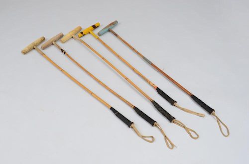 GROUP OF FIVE PAINTED WOOD AND BAMBOO POLO MALLET'S, USED BY WINSTON F. C. GUEST