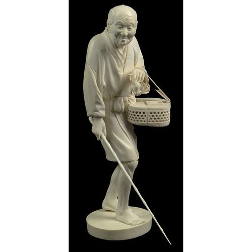 Finely Carved 19th Century Japanese Ivory Sculpture of Man Gigging Frogs.