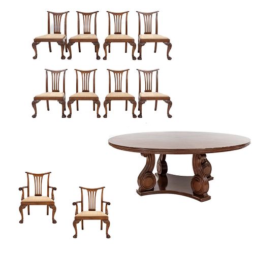 Comedor. SXX. Estilo Chippendale. Elaborado en madera.  Consta de: mesa con cubierta circular, 8 sillas y 2 sillones.