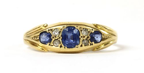 A gold sapphire and diamond ring,