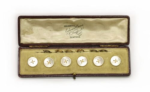 A cased set of six gold mother-of-pearl buttons,