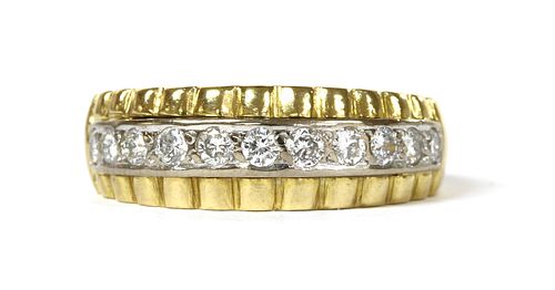 A gold diamond half eternity ring,