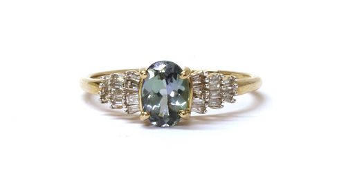 A 9ct gold zoisite and diamond ring