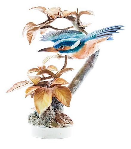 A Royal Worcester Bisque Ornithological Figure, Dorothy Doughty Height 11 3/4 inches.