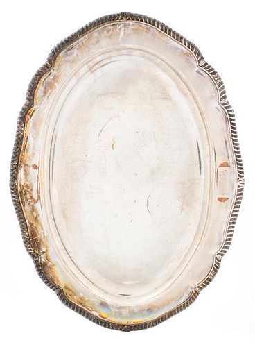 * A Collection of Silver-plate Trays Width of widest 22 1/2 inches.