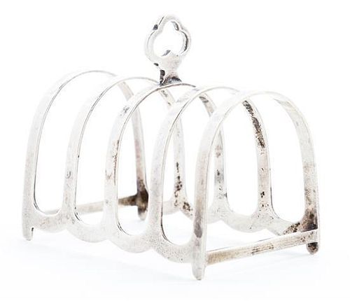 * An English Silver Toast Rack. Width 2 3/4 inches.