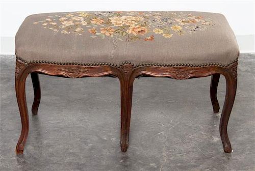 * A Louis XV Style Walnut Tabouret Width 33 inches.