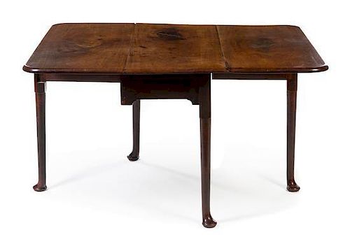 * A Mahogany Dropleaf Table Height 27 1/2 x width 42 1/2 x depth 17 1/2 inches (closed).