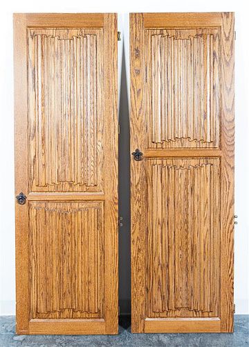 Two Gothic Revival Oak Doors. Height 74 x width 23 3/4 inches.