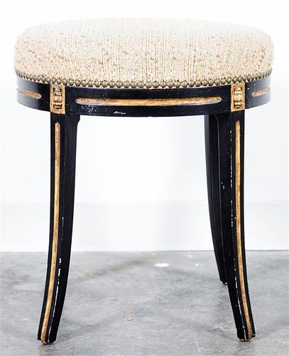 * A Victorian Ebonized and Parcel Gilt Stool Height 19 x width 17 x depth 15 inches.
