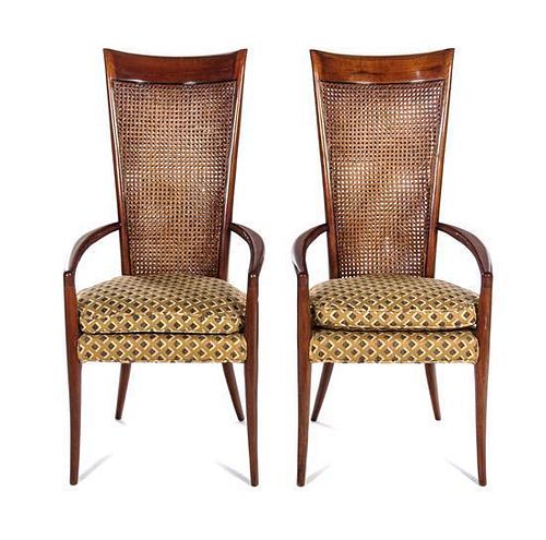 A Pair of Cane-Back Armchairs Height 44 inches.