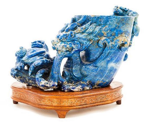 A Carved Lapis Lazuli Libation Cup Width 6 1/4 inches.