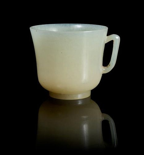 * A Celadon Jade Teacup Height 2 3/8 inches.