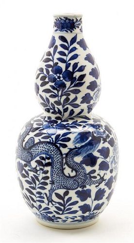 A Blue and White Porcelain Double Gourd Vase Height 9 1/4 inches.