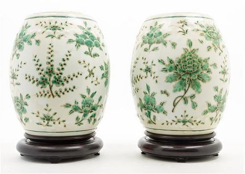* A Pair of Polychrome Enameled Porcelain Jars and Covers Height 8 1/4 inches.