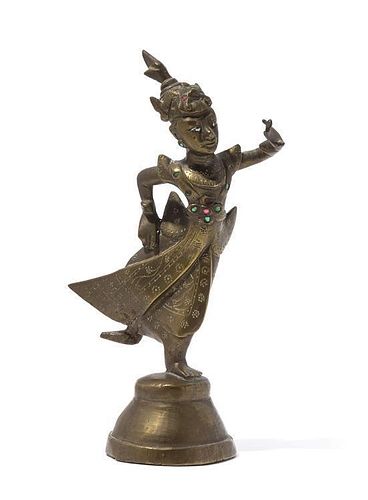 A Bronze Figure of a Deity Height 8 inches.