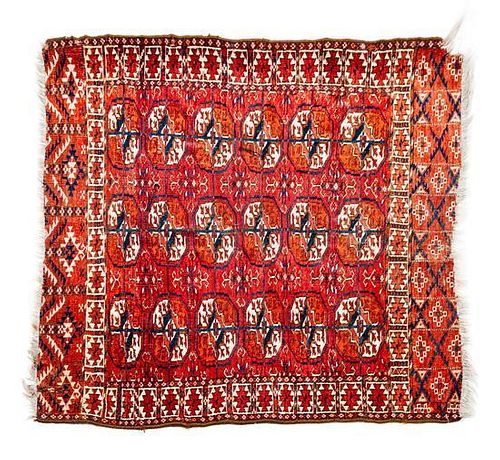 A Bokhara Wool Mat 3 feet 1 inch x 2 feet 10 inches.