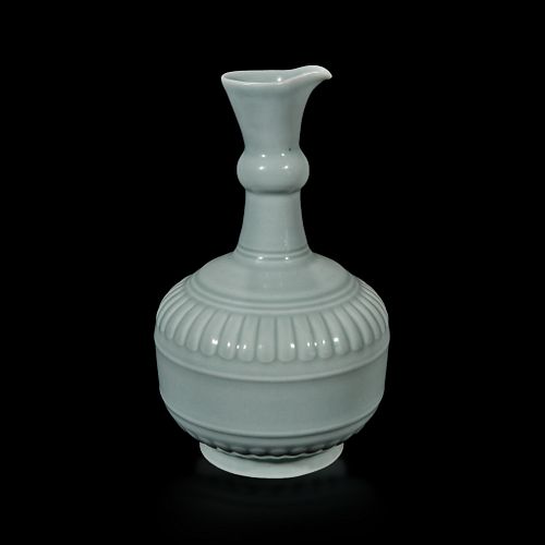 A Chinese "claire de lune" or pale celadon-glazed pouring vessel
