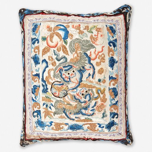 A Chinese embroidered silk "Buddhist Lions" panel, mounted as a pillow 刺绣太狮少狮画片嵌枕头 The panel Qing Dynasty 画片为清代