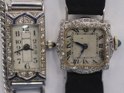 JEWELRY. (2) Lady's Platinum and diamond Watches.