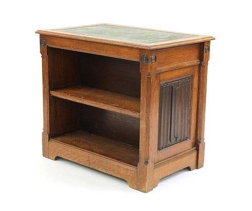 An oak Gothic Revival double-sided open bookcase,