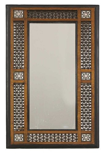 An Aesthetic Movement Moorish mahogany mirror,