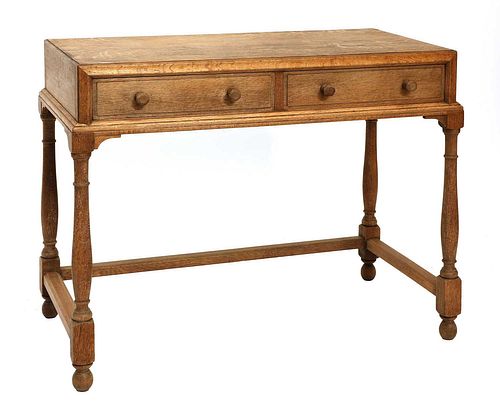 A Cotswold School oak dressing table,
