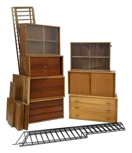 A collection of teak wall-mounted cabinets,