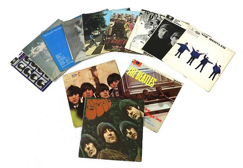 A collection of The Beatles vinyl records and ephemera,