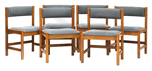 A set of six oak dining chairs,