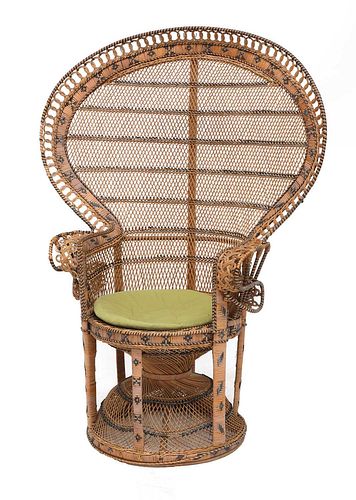 An Emmanuelle wicker peacock chair,
