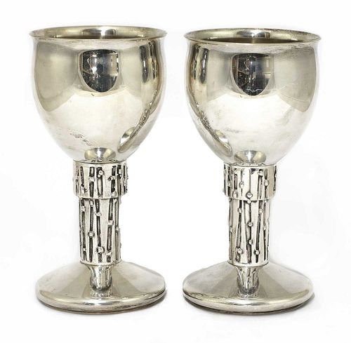 A pair of silver goblets,