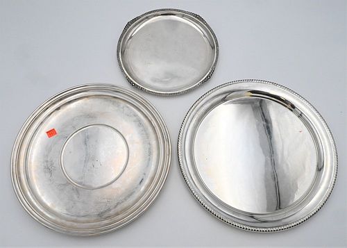 Group of Three Large Silver Round Trays
largest marked with sterling by Frank Whiting Company 1814
the other marked Lord Saybrook International Sterli