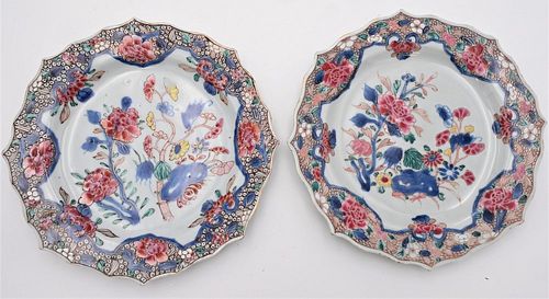 Pair of Chinese Qianlong Porcelain Plates
having enameled flowers and decorative border
18th century or later
Solveig and Anita Gray, London sticker o