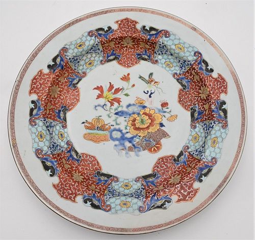 Chinese Export Porcelain Charger
having painted, enameled and gilt decoration
old repair 
diameter 14 inches
Provenance: From a private New York City 