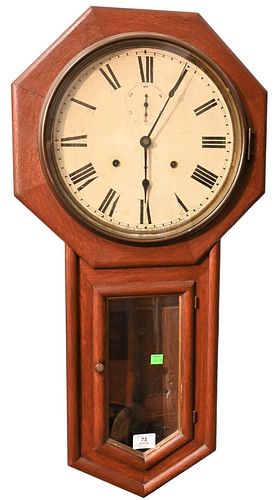 Seth Thomas Schoolhouse Regulator Wall Clock,
having oak case with thirty day movement painted metal dial and second hand dial,
original paper label o