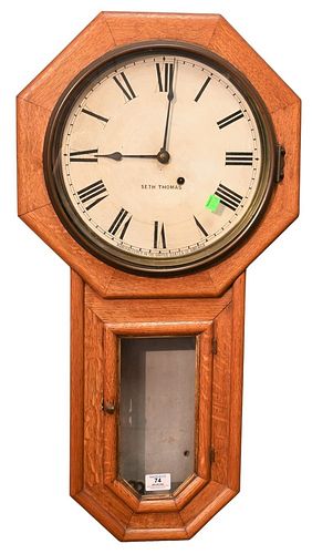 Seth Thomas Schoolhouse Regulator Wall Clock
having oak case 30 day movement, painted metal dial marked Seth Thomas 
length 31 inches
Provenance: Fift