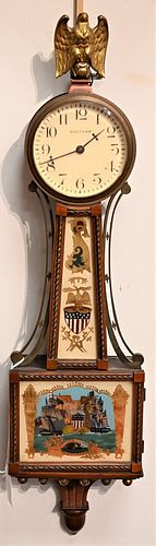 Waltham Miniature Banjo Clock
having mahogany case, painted dial and brass rope front trim, reverse painted tablets of ship battle
length 21 1/2 inche