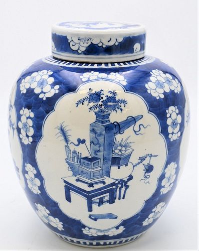 Chinese Porcelain Blue and White Jar with Cover
panels painted with antiques, blossoming tree with bird
four character mark on bottom
Qing Dynasty
18t