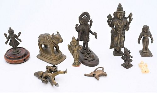 Nine Piece Bronze Lot
to include miniature sculptures of Hindu gods
including Ganesh, Vishnu, Kali, and a horned bull
tallest 5 1/2 inches