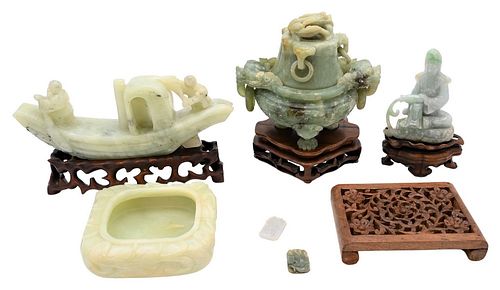 Six Carved Chinese Jade, Jadeite, and Stone Items
to include square jade bowl on stand, covered urn having foo dog head handles, jadeite seated figure
