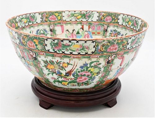 Large Rose Medallion Punch Bowl decorated with mandarin panels and detailed butterfly and flower border on wooden base 2012 Tucker Frey Antiques Recei