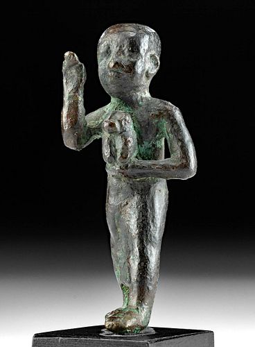Egyptian Bronze Striding Priest Holding a Baboon