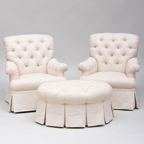 Pair of Upholstered Club Chairs Together with a Matching Ottoman