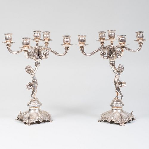 Pair of Continental Silver Figural Five-Light Candelabra