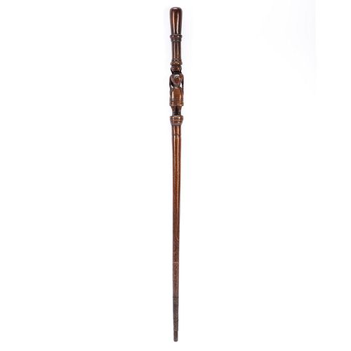 CARVED WOODEN CANE, FROM MARCY CARSEY COLLECTION