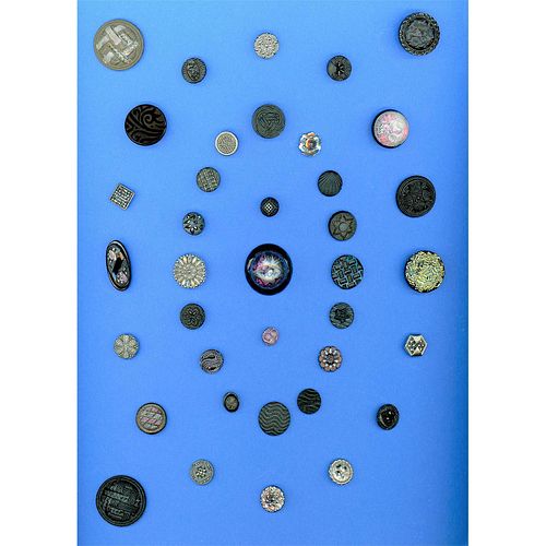 A CARD OF ASSORTED DIV 1 BLACK GLASS DESIGN BUTTONS